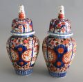Pair Imari Ribbed Vases with Foo Dog Lids