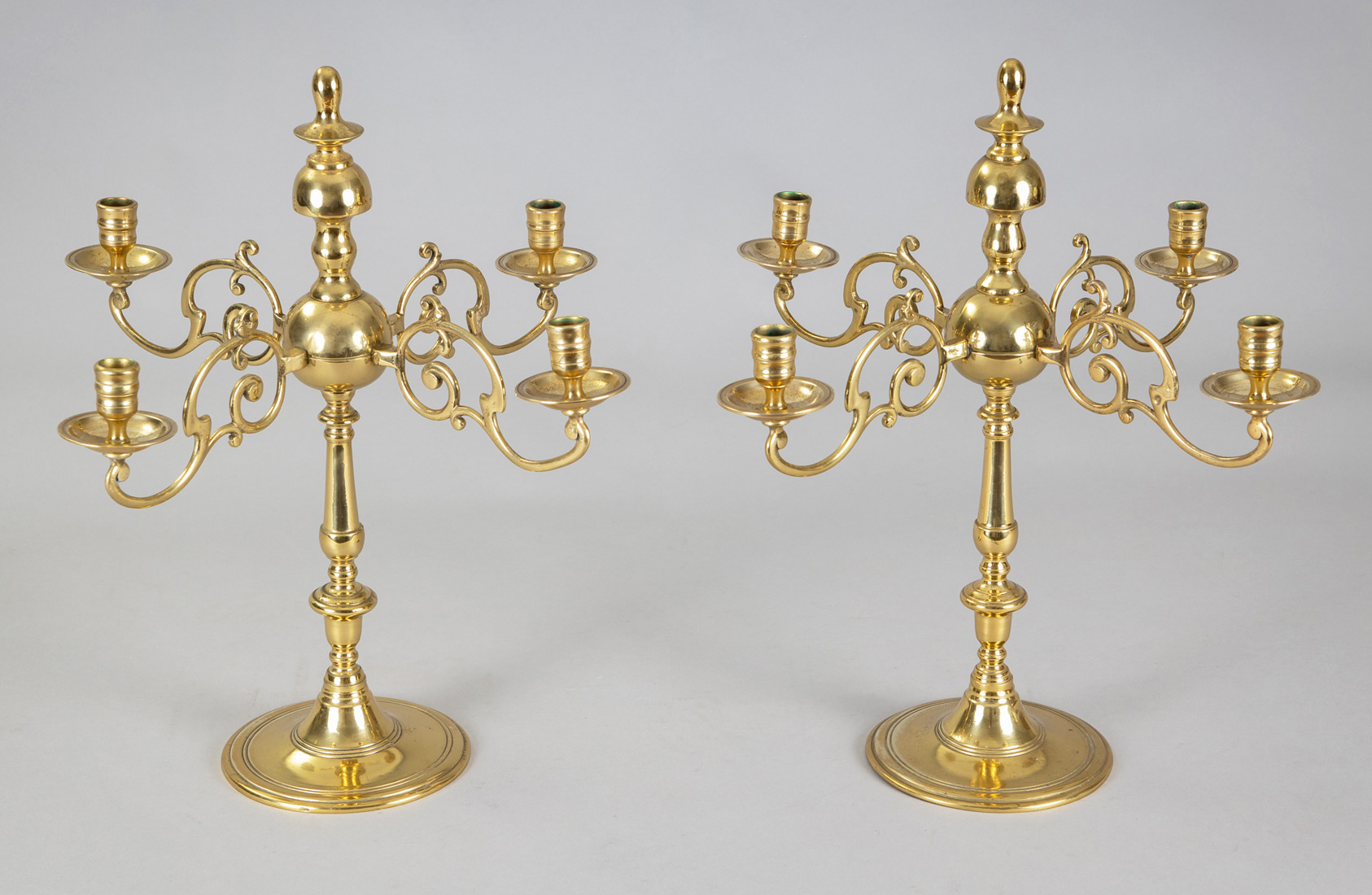 https://susansilverantiques.com/wp-content/uploads/antique-pair-english-brass-candelabra-angle-front-susan-silver-antiques-7898.jpg