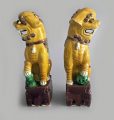 Chinese Export Yellow Foo Dogs, a Pair