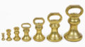 Victorian Set Seven Brass Bell Form Weights
